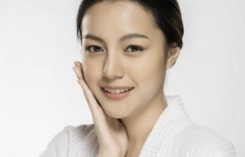 beautiful face of a happy Asian woman after face cosmetic procedures